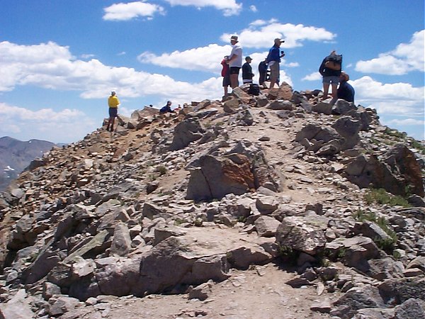 Crowds on the summit of Huron Peak (14,005 feet) around noon.  No thunderstorms in sight!