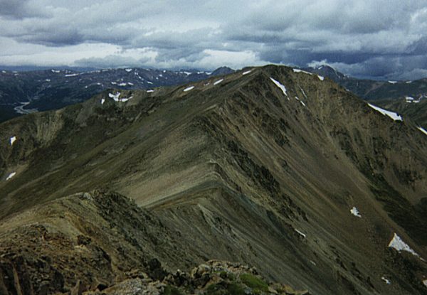 The ridge (left center) to the summit of Mount Parnassus as seen from Bard Peak.