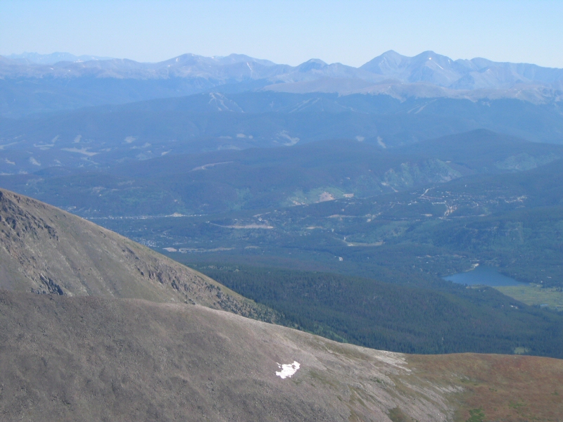 The lake down low is called Goose Pasture Tarn.  Off in the distance, from left to right, are Grays Peak and Torreys Peak, Mount Parnassus, and Pettingell Peak.