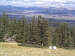 A father and son enjoying the view with Leadville below.