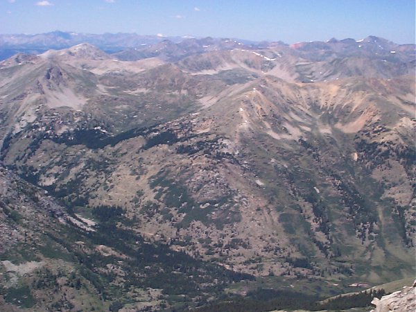 Averaging three miles to the west, you can see a long section of the Continental Divide and several shorter peaks including Granite Mountain and another Grizzly Peak.