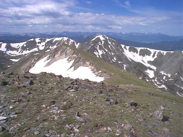 A view of Bill's Peak and the Gore Range on the horizon to the west.