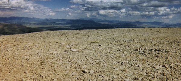 From the summit of Mount Bross one can barely make out Pikes Peak on the horizon.