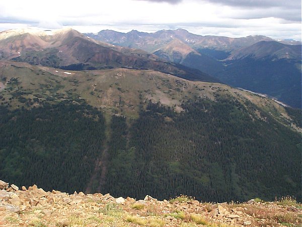 Baker Mountain (12,488 feet) looks like a ridge when seen in front of Mount Sniktau (13,234 feet).  Visible beyond that (from right to left) is Mount Parnassus, Woods Mountain (12,940 feet), Mount Bethel, Pettingell Peak, Hag Peak (13,294 ft. - Citadel Peak?), and Hager Mountain.
