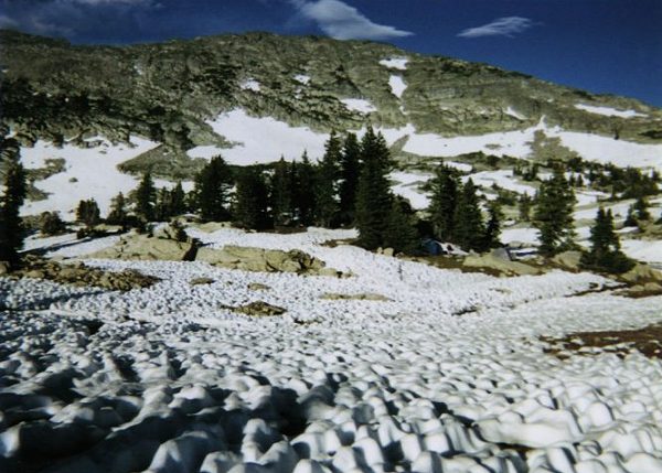 Our campsite just beyond the sun-cupped snow.