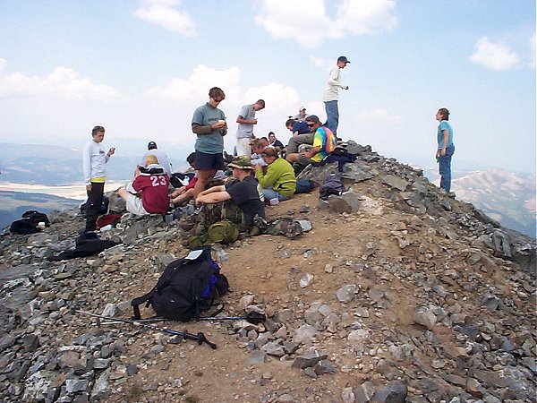 Upon reaching the summit of Pacific Peak (13,950 feet) on this mid-week hike, I was surprised to find a group of about two dozen people on the top.  Hopefully this church group from Texas heeded my advice not to stay too long as there was weather moving in quickly.