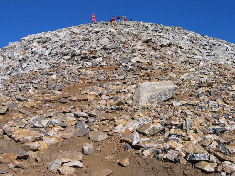 The trail continues up through the rocks.  No - that's not the summit.