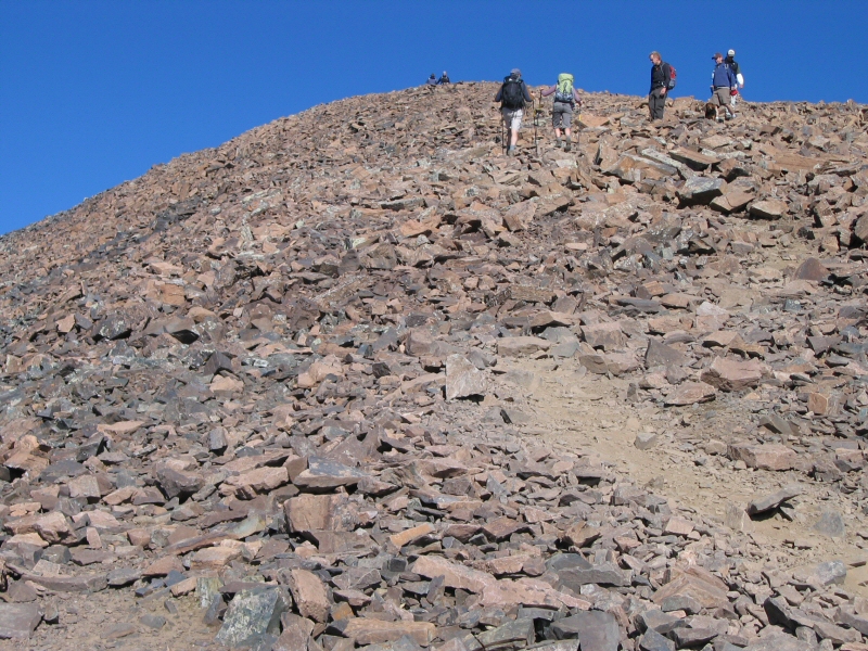 More rocky trail up towards the summit.  Notice there are people already coming down.  They must have started before sunrise.