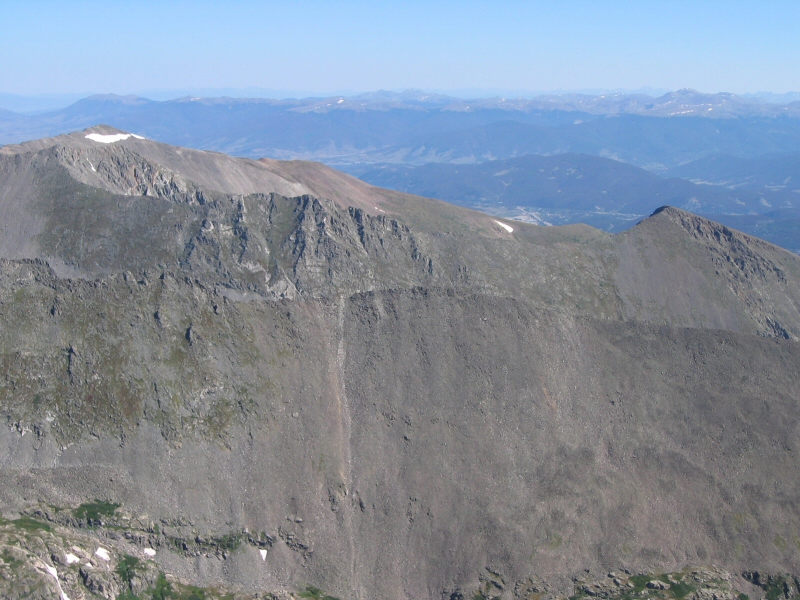I think that's Mount Helen (elevation 13,164 feet) and the Williams Fork Mountains in the distance beyond the towns of Dillon and Silverthorne.