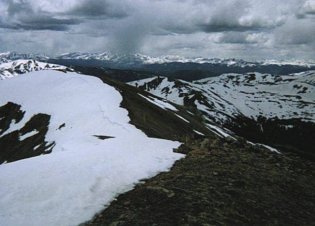 Looking back along the ridge from the summit with the Tenmile Range in the background.