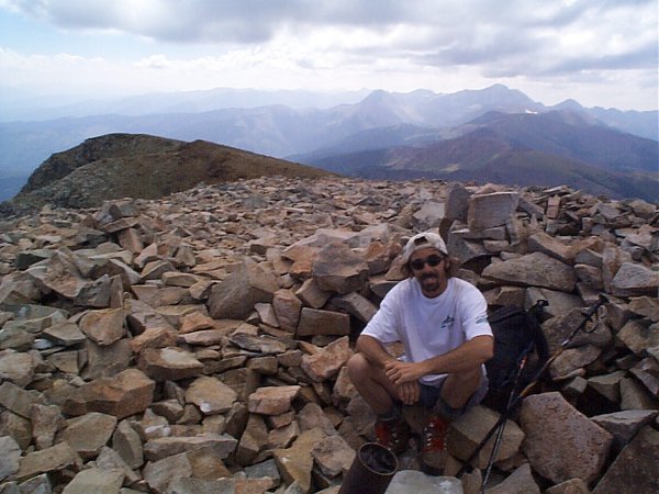 Tommy, relaxing at the register with Capitol Peak in the background.