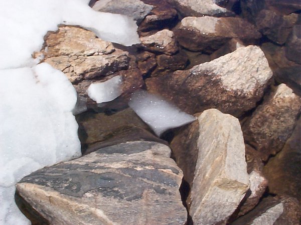 This image may not mean much to you but I thoroughly enjoyed observing this small piece of ice floating along the edge of this little lake while I relaxed.