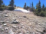 That's the top up there.  It may look steep but the trail slopes gently across the face of the mountain.