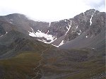 Clouds threaten the summit of Grays and Torreys Peaks with the trail to Grays and Torreys clearly visible in the center of the photo.