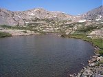 A short distance above the waterfalls you arrive at the first of several high mountain lakes.  This one sits at about 11,900 feet.