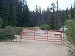 The gate where the trail begins.  Beyond the gate, head left as the trail corresponds to the road for approximately the first third of a mile.