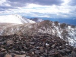 After walking across the saddle seen in the second photo, I arrived on the summit of Gemini Peak (elevation 13,951 feet).  I see that I just have to get over there to the big one in the sun - that shouldn't be too hard.