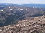 Hartenstein Lake is almost hidden in this valley to the west-southwest of the summit.  Cottonwood Pass is just beyond the ridge while Taylor Park Reservoir is slightly visible in the distant right of this photo.